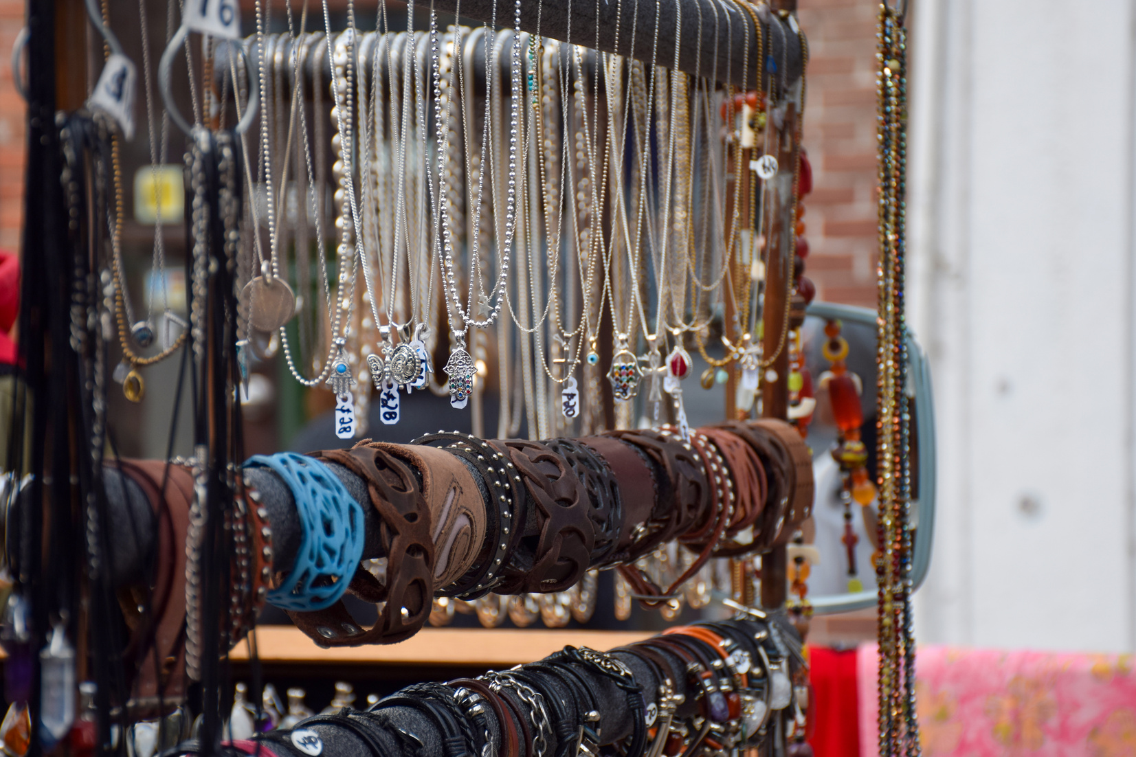 Handmade artisanal jewelry and accessories at a street market